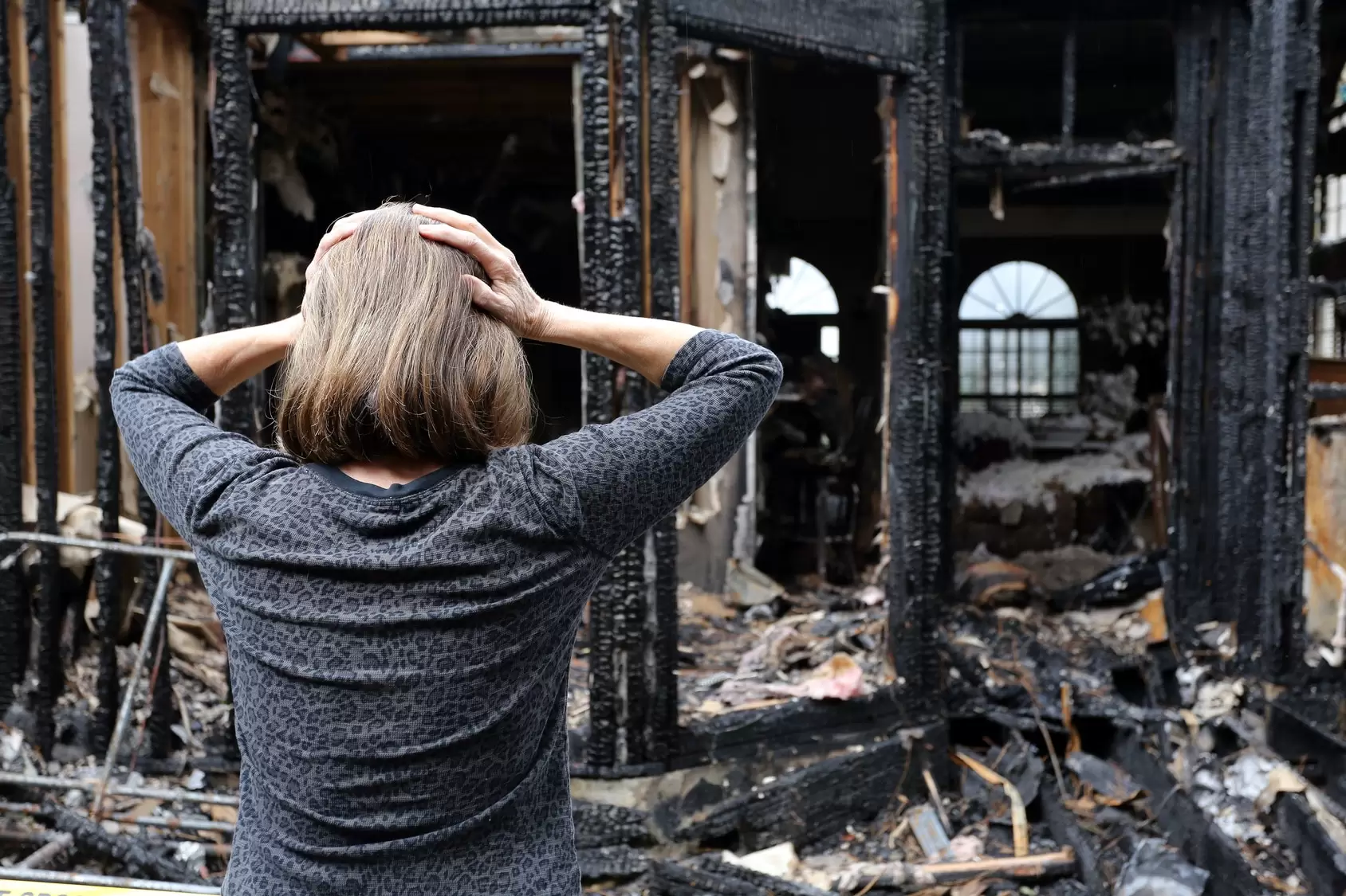 Fire damage woman stressed